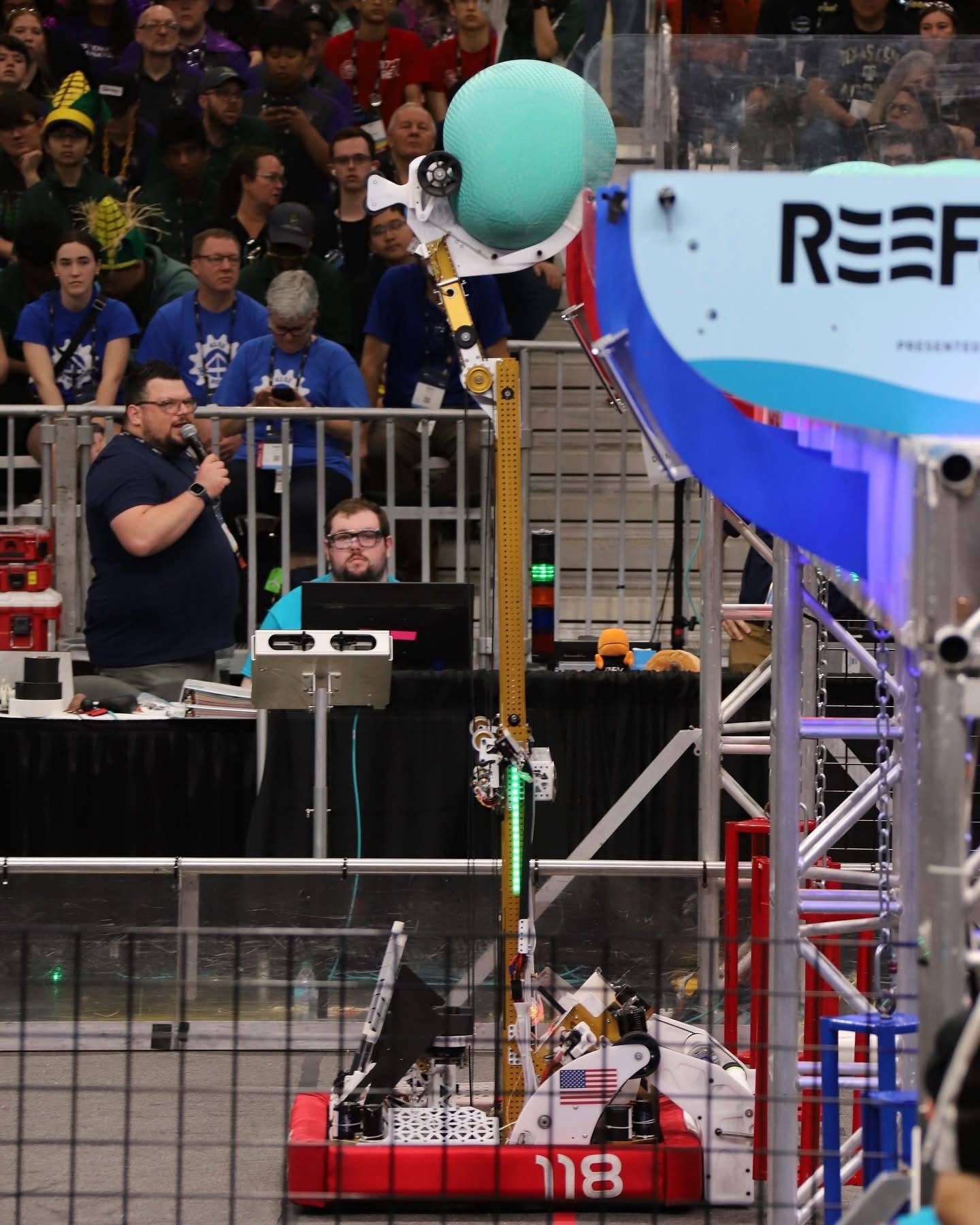 Robot scoring a game piece at the district championship