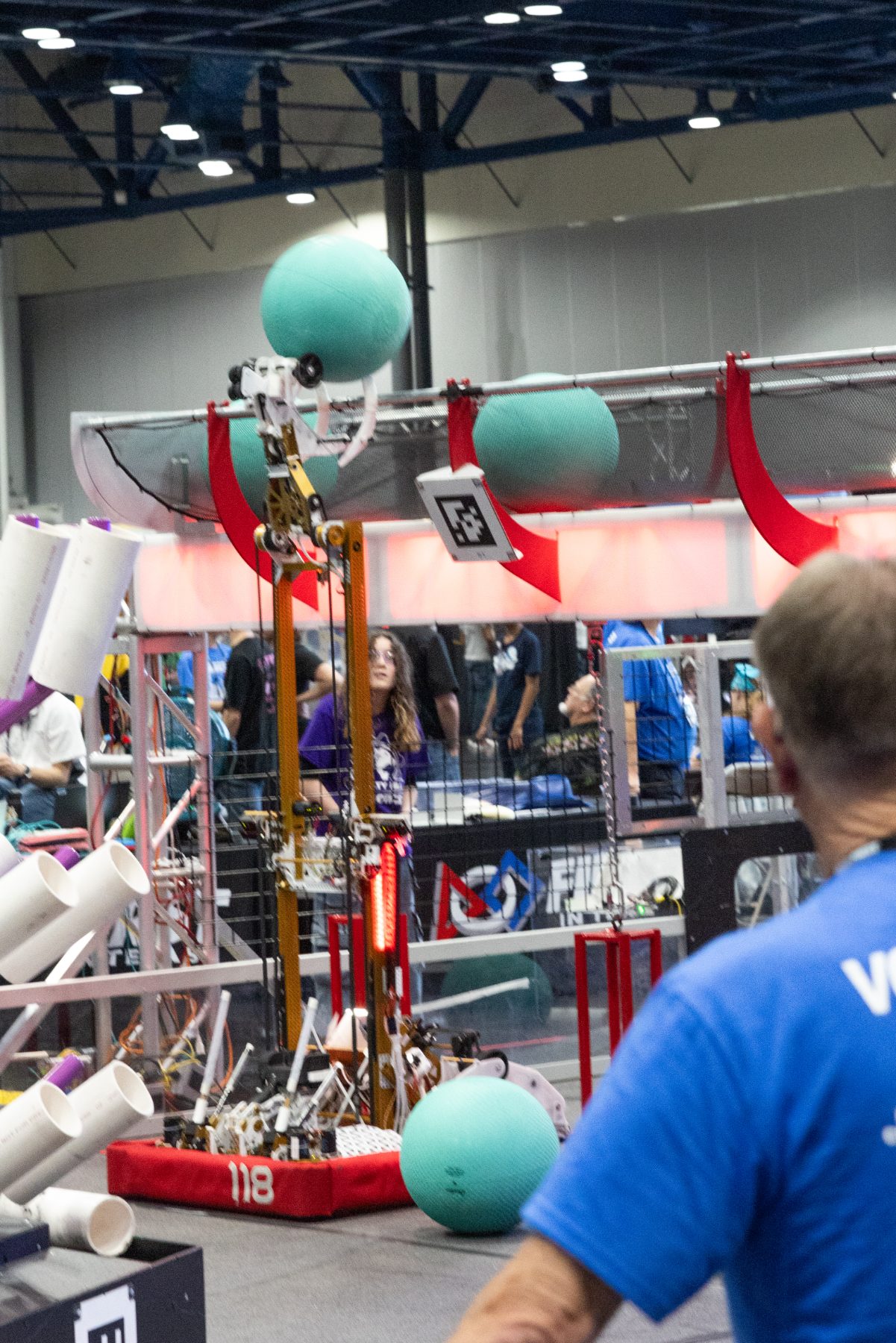 Manipulator arm extended over the field structure