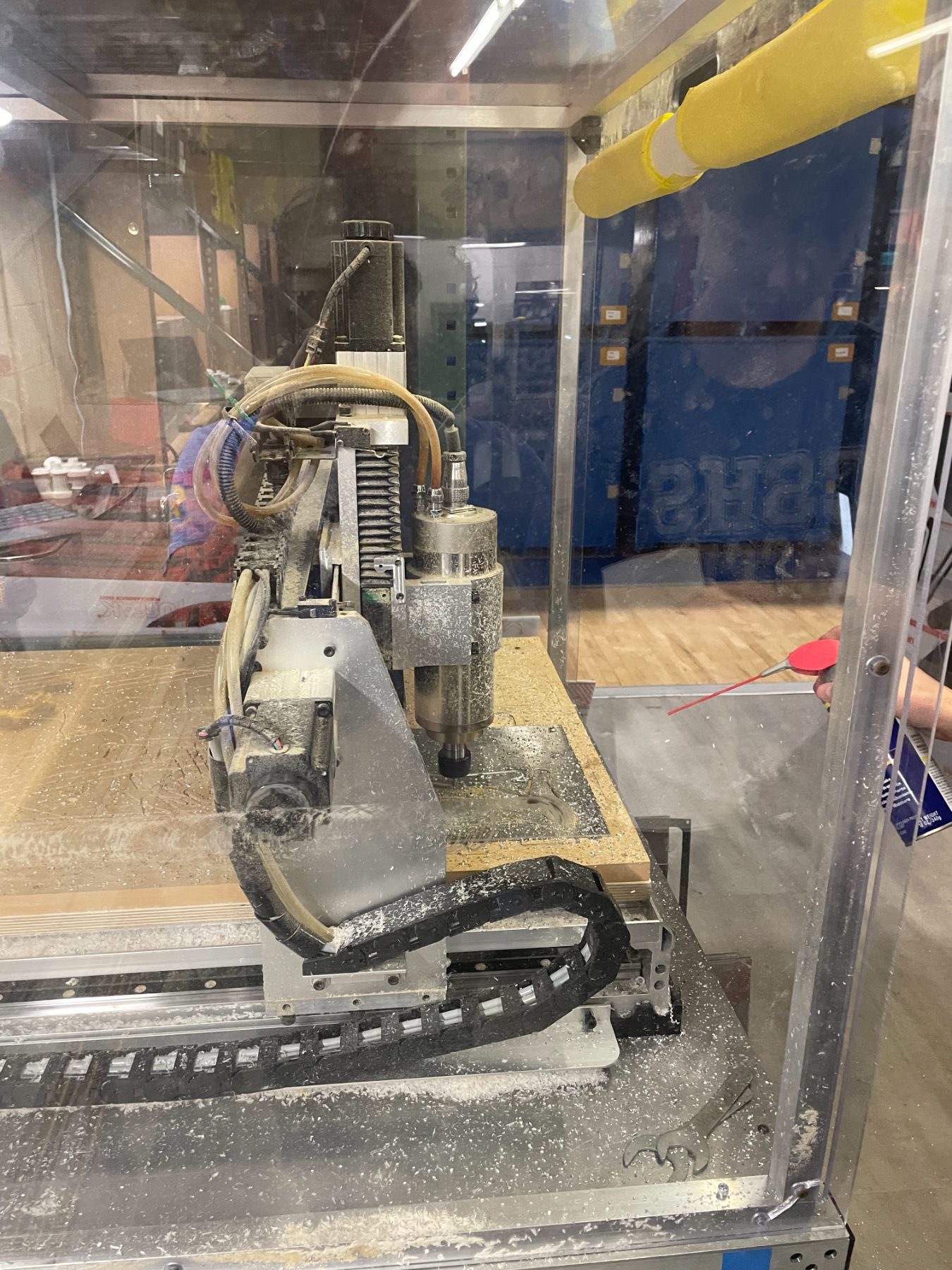 CNC router spindle inside its enclosure