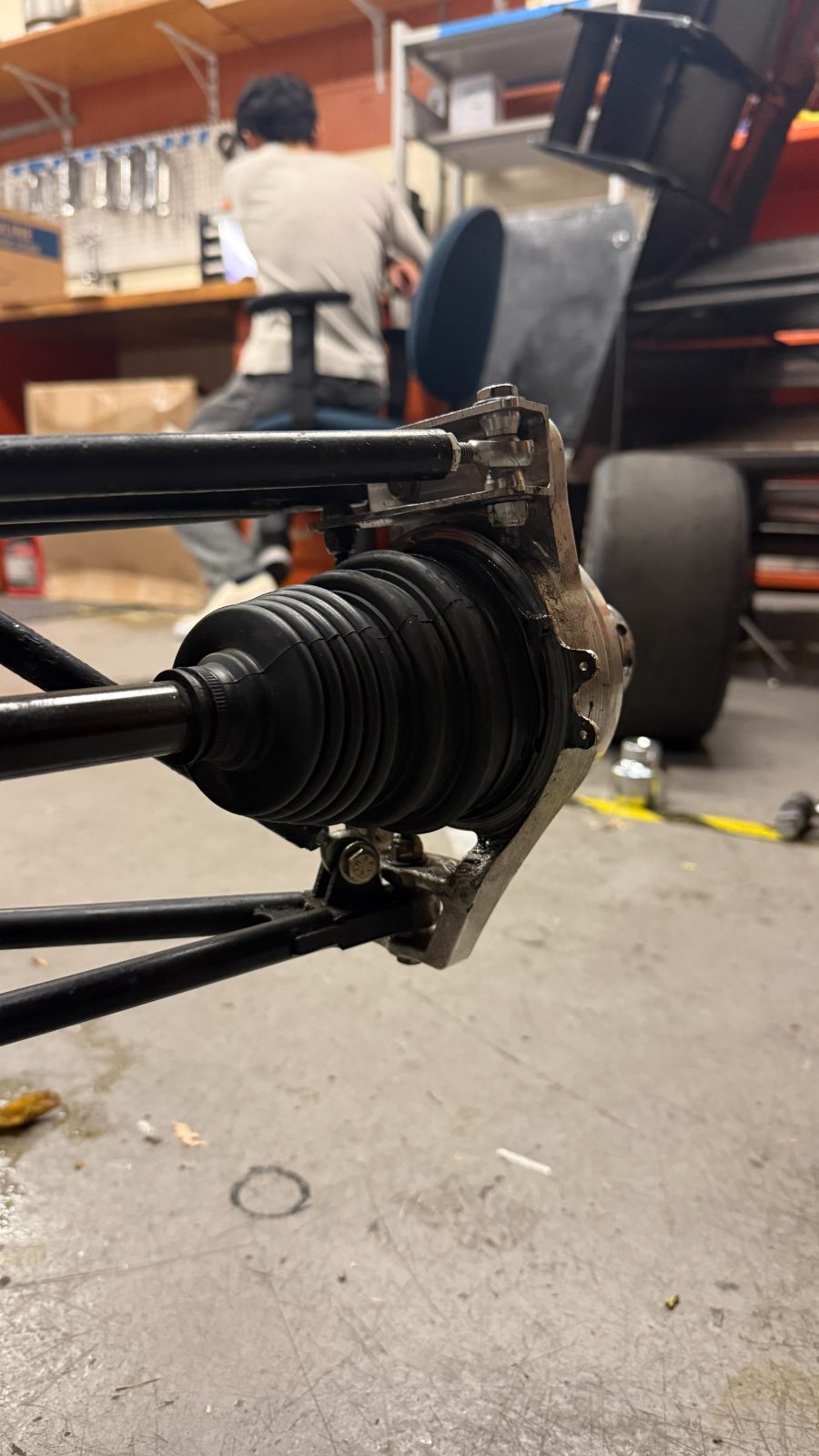 CV boot seated against the rear upright