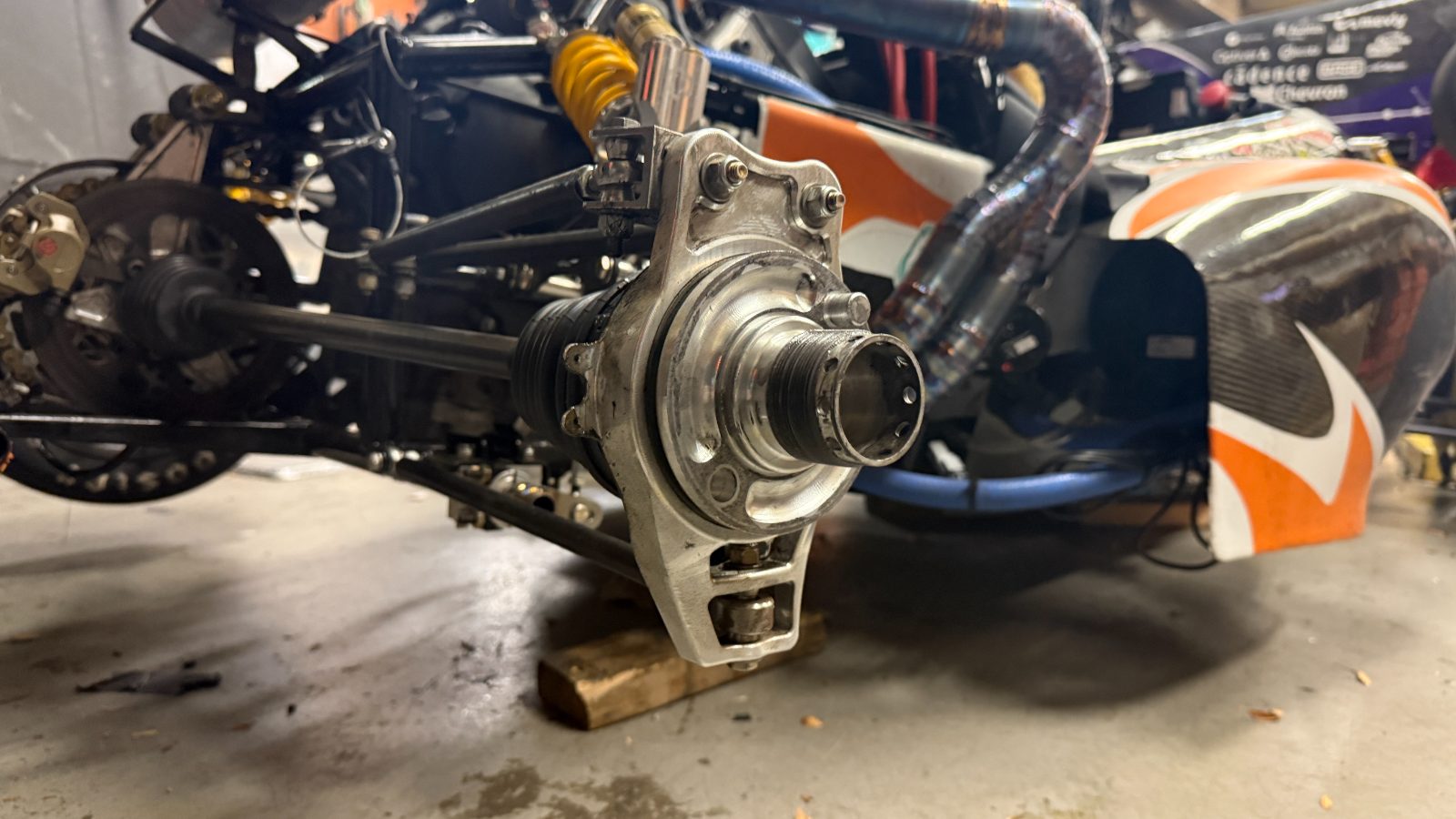 Rear upright installed on the car, hub and axle boot in place