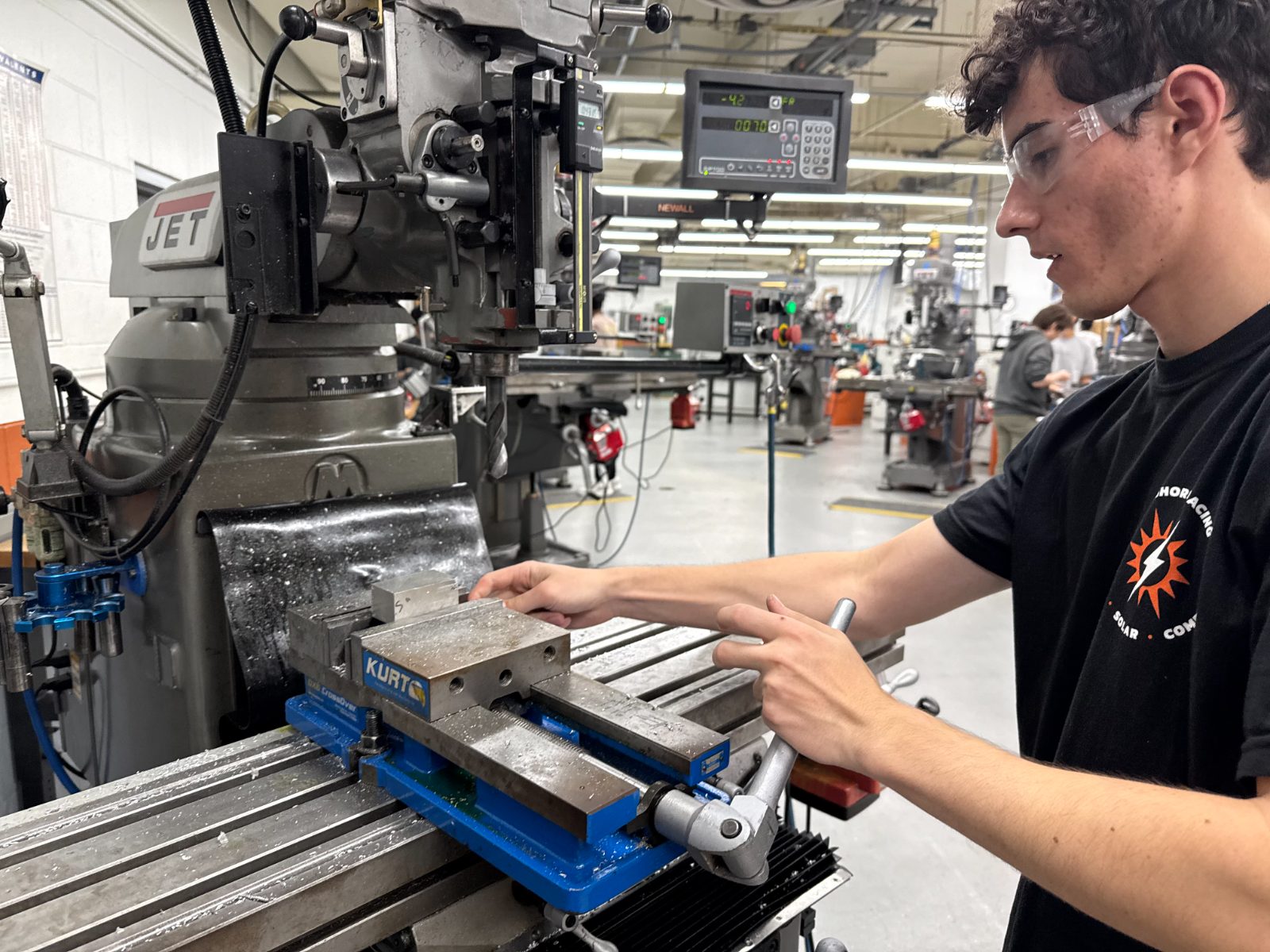 Squaring aluminum stock in a vise on a manual mill