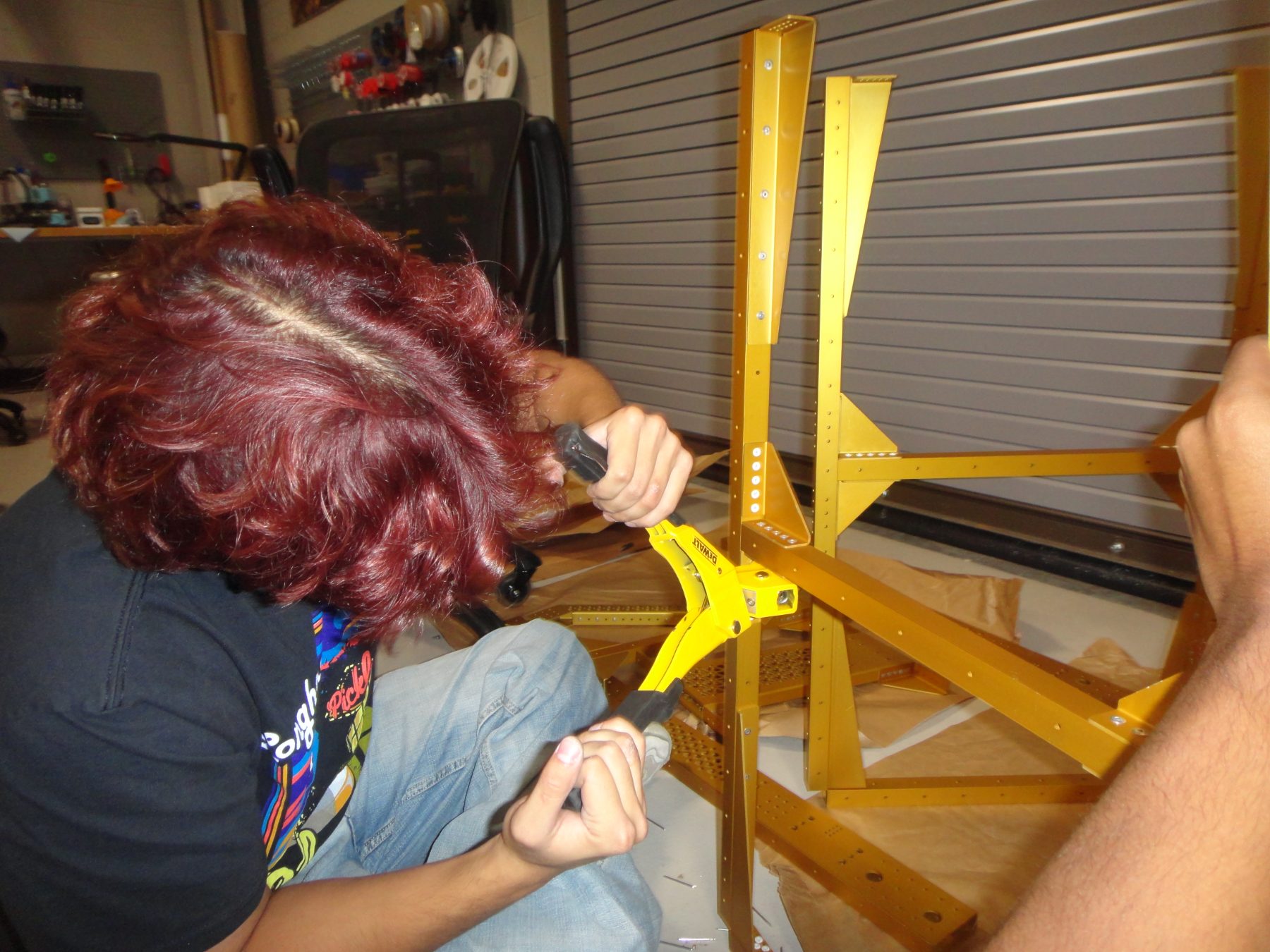 Riveting the cart frame
