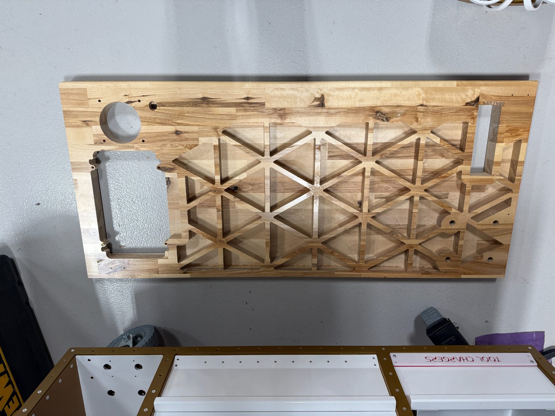 Maple side panel with pocketed triangle relief